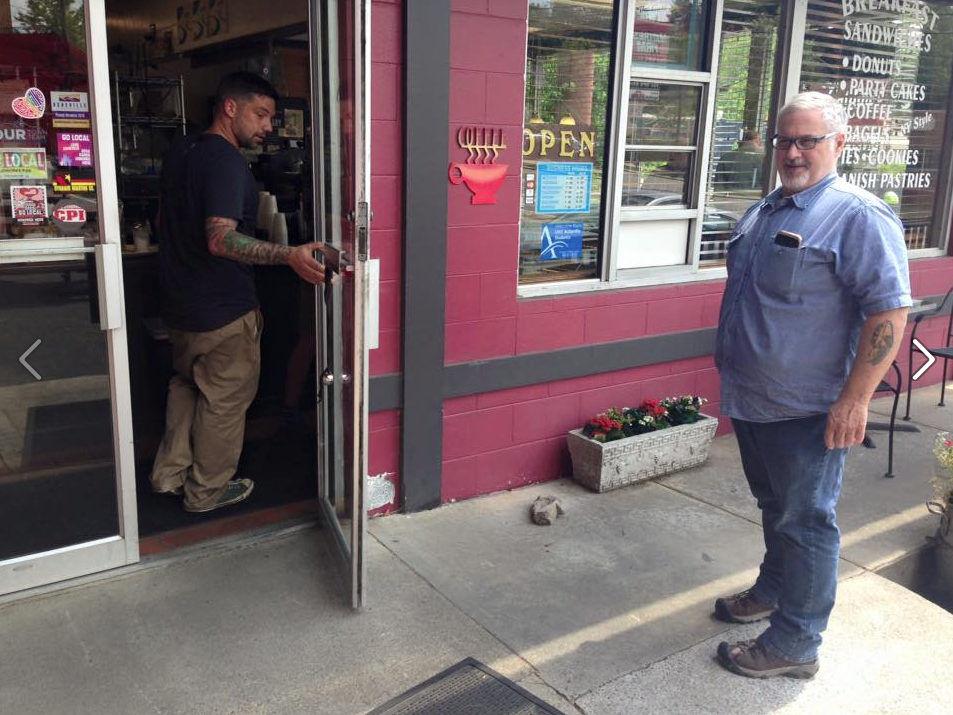 Rob holds the door for his dad, Bob.